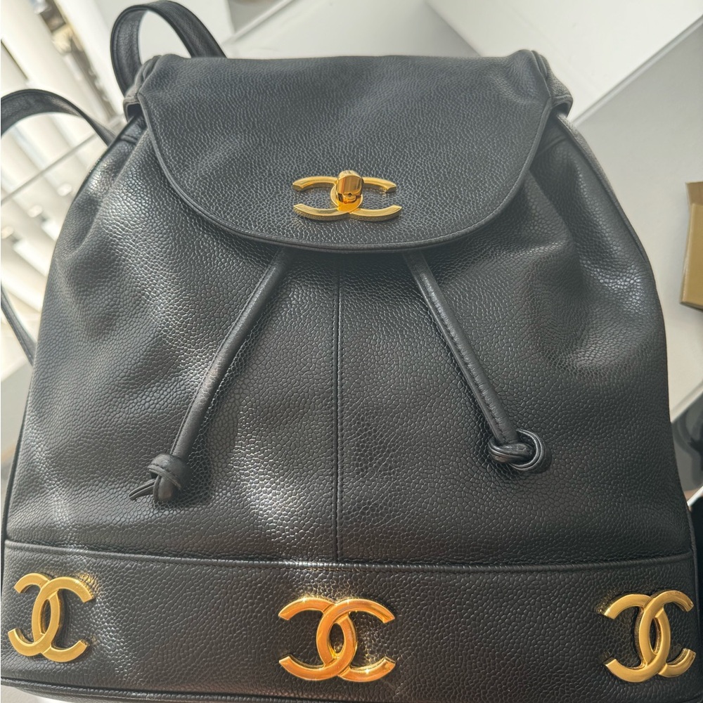 Chanel Black Leather Backpack with Gold Accents